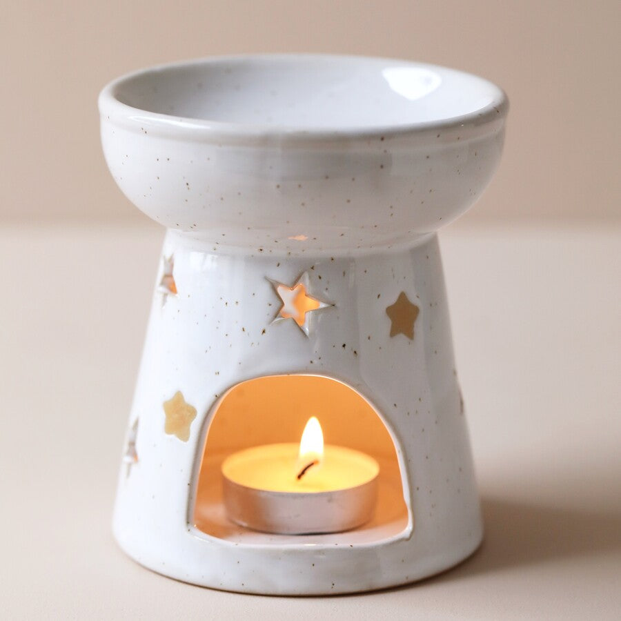 https://themunroshop.com/cdn/shop/products/ceramic-starry-wax-melt-burner-4x3a6474-900x900_900x.jpg?v=1668521196